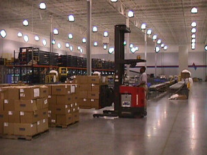  A forklift driver moves packages inside International Packaging & Distribution's warehouse facility.